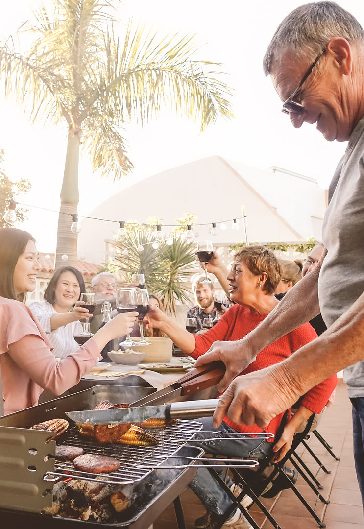 Family Enjoying BBQ Celebrating Retirement