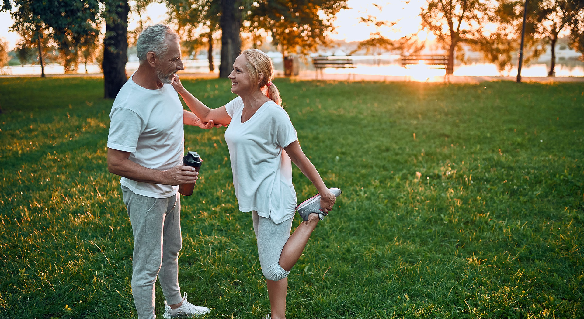 Retired Couple Stretching for Workout - Health
